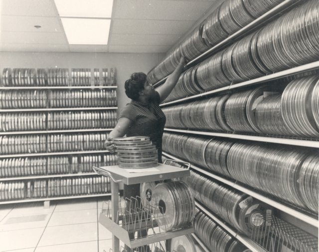 _Dorothy Whitaker works in the National Oceanographic Data Center (NODC) magnetic tape library. [Source: Wikipedia](https://commons.wikimedia.org/wiki/File:NDOC_magnetic_tape_library.jpg)_